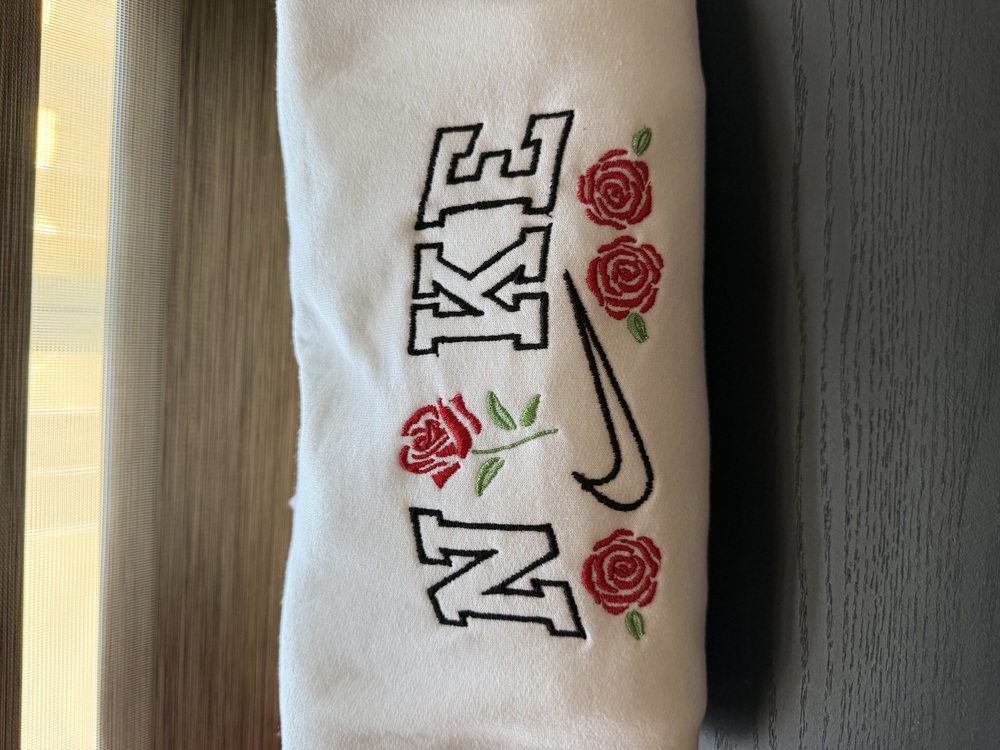 Nike rose embroidered sweater
